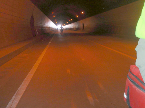 Reverse camera shot (in tunnel).